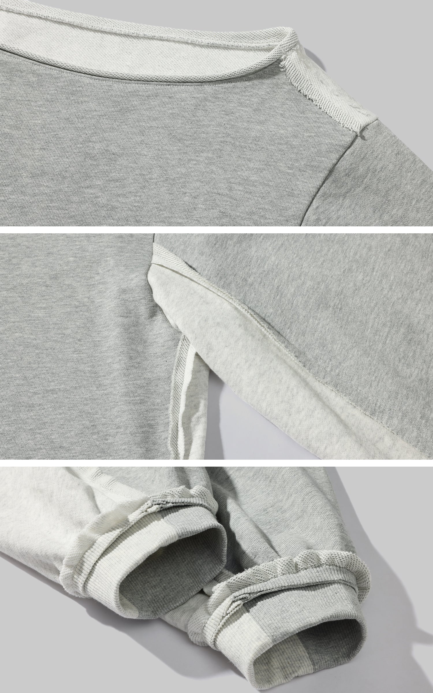 Gray sweatshirt with white trim on a light gray background