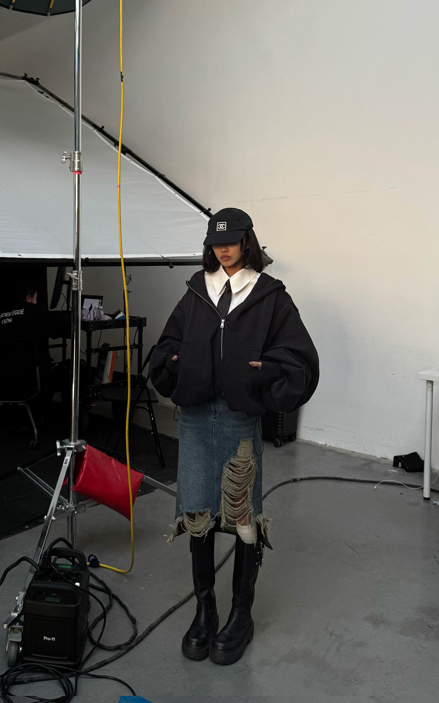 WARDEN EDGE Distressed Denim Midi Skirt with Asymmetrical Hem - PINKPARKS