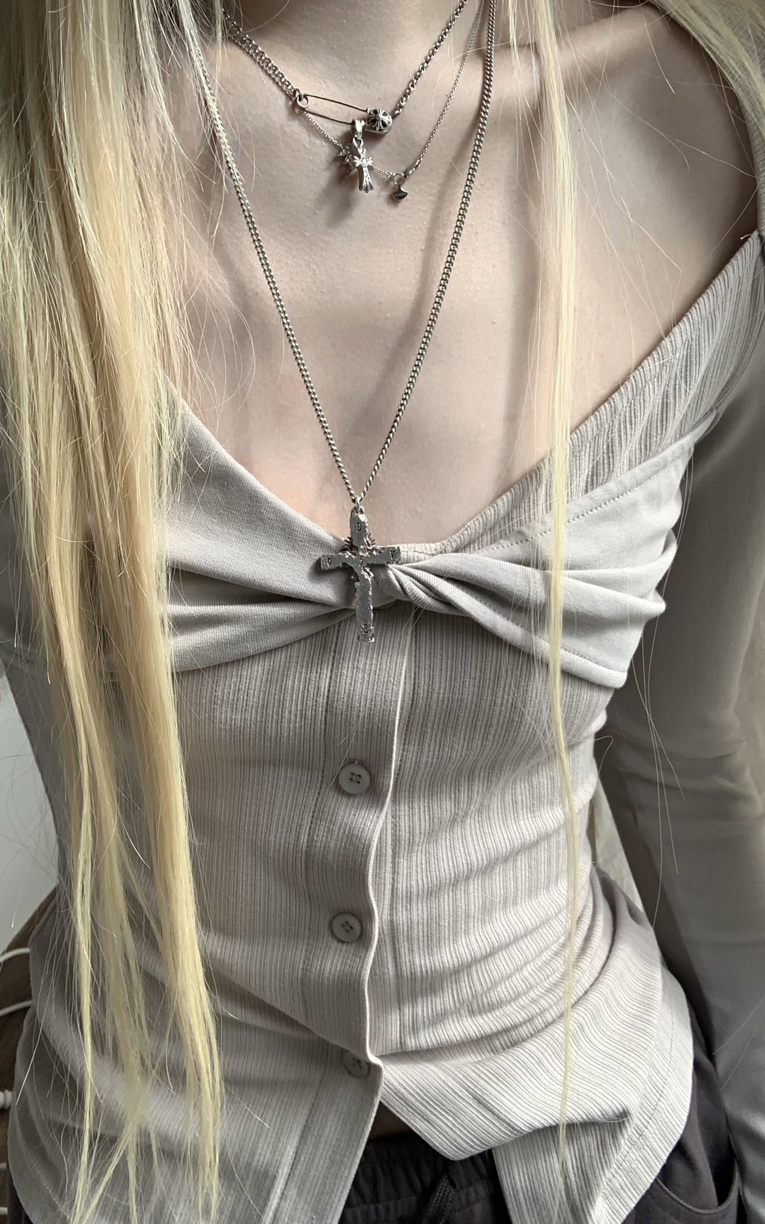 Rase le sol ツイストノットリブ編みオープンネックトップ